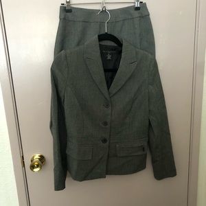 Gray skirt suit.